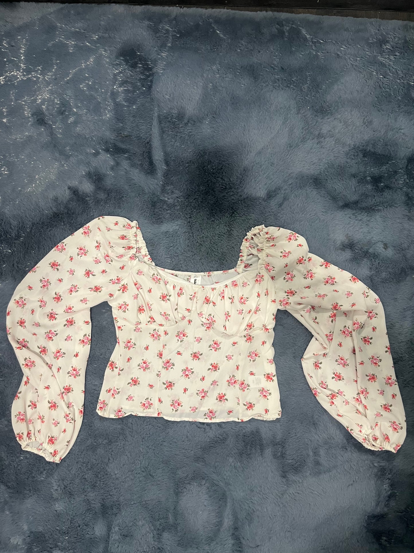 Blusa blanca floreada